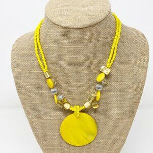 Large Yellow Disk Pendant on Yellow Beaded Necklace